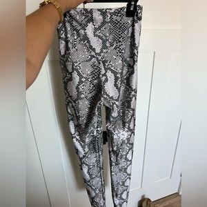Emily Hsu Designs Size Small white snakeskin leggings small AKT logo.